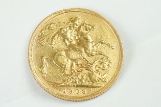A King Edward VII 1909 full gold sovereign coin with Melbourne mint mark.