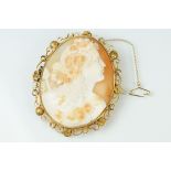 Large 19th century shell cameo yellow metal brooch, the carved shell cameo depicting female bust