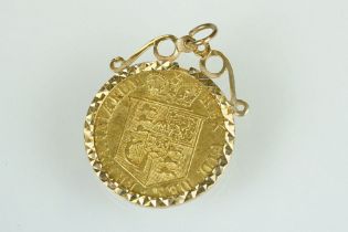 George III half guinea coin pendant, the half guinea dated 1817, shield back, yellow metal mount