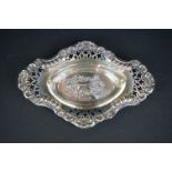 Edwardian silver bon bon dish, marquise form, repousse floral and scroll decoration, pierced border,