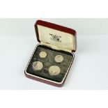 A United Kingdom Royal Mint 1979 Silver Maundy Money Set Of Four Coins Within Red Display Case.