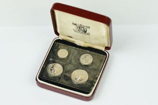 A United Kingdom Royal Mint 1979 Silver Maundy Money Set Of Four Coins Within Red Display Case.