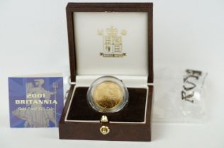 A Royal Mint United Kingdom 2001 Britannia gold proof £25 1/4oz coin, complete with COA and set