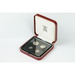 A United Kingdom Royal Mint 1989 Silver Maundy Money Set Of Four Coins Within Red Display Case.