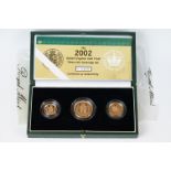 A Royal Mint United Kingdom Queen Elizabeth II 2002 gold proof sovereign three coin collection to