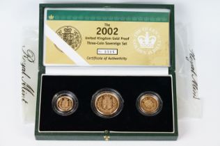 A Royal Mint United Kingdom Queen Elizabeth II 2002 gold proof sovereign three coin collection to