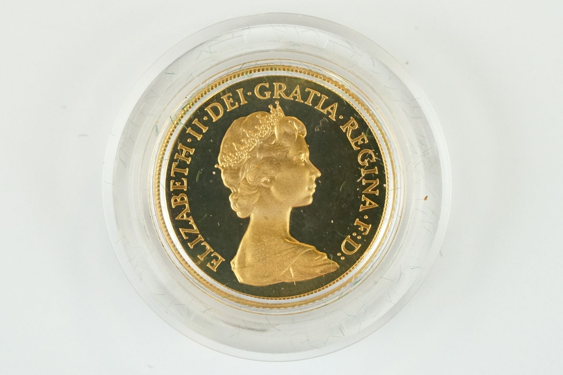 A British Royal Mint Queen Elizabeth II 1980 gold proof full sovereign coin within green Royal - Image 3 of 4