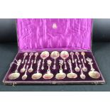 Set of anointing spoons and apostle finial spoons, parcel gilt, various sizes and marks, 20 in