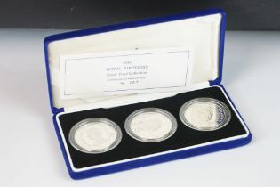 A Royal Mint 2001 Royal Birthday silver proof three coin set comprising of Alderney, Guernsey and