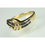 Diamond and sapphire 18ct yellow gold ring, twenty small square cut sapphires, nineteen small