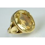 Citrine 18ct yellow gold ring, the oval cut citrine measuring approx 17.5mm x 12.5mm, rubover set,
