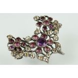 19th century paste set white metal brooch, floral design, closed back settings, hinge and simple