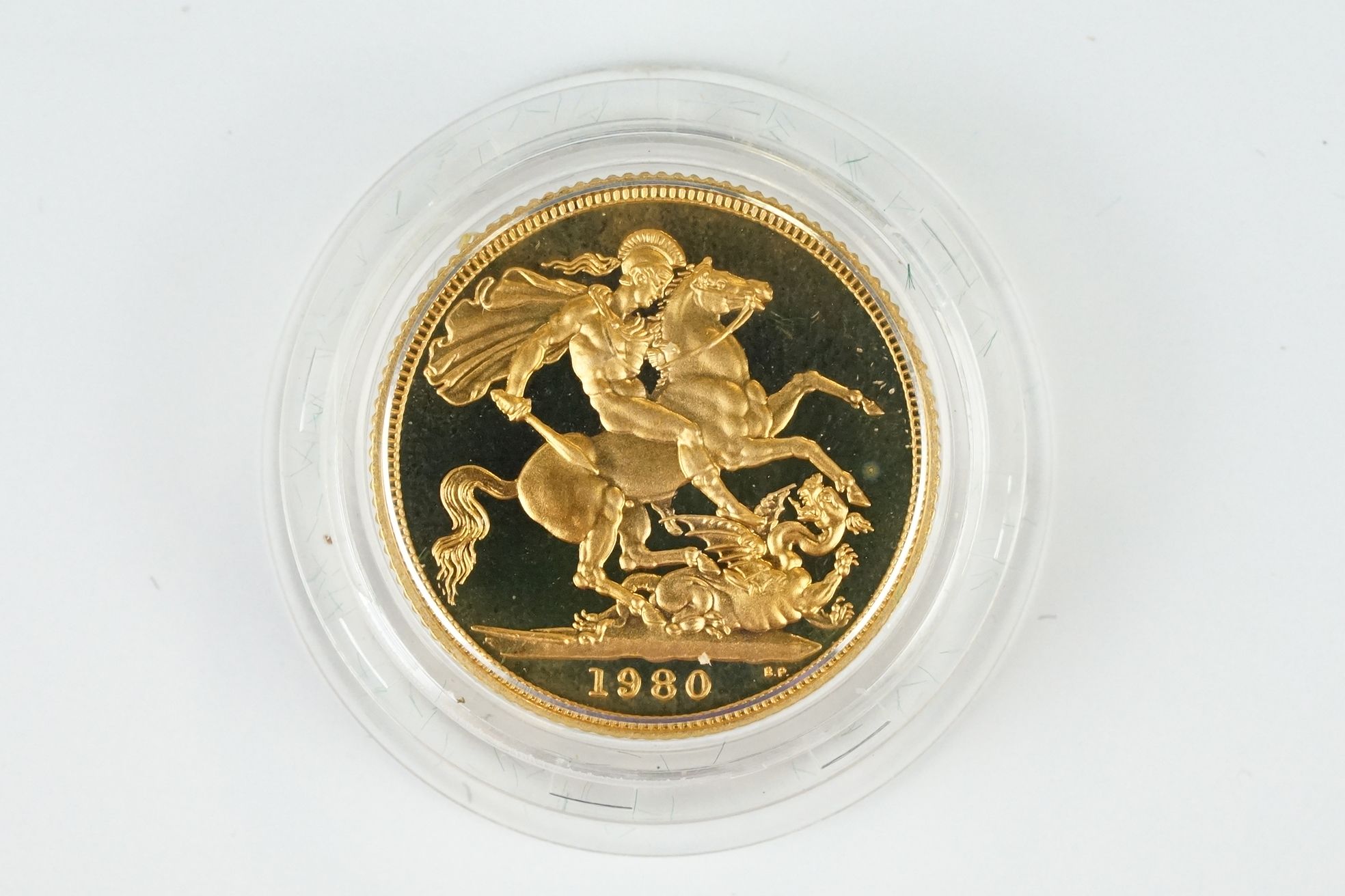 A British Royal Mint Queen Elizabeth II 1980 gold proof full sovereign coin within green Royal - Image 2 of 4