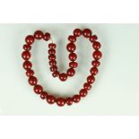 Cherry amber Bakelite necklace, circular and flatten circular beads, dimensions approx 20 x 20mm and