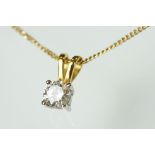 Diamond solitaire 18ct yellow gold pendant necklace, the round brilliant cut diamond weighing approx
