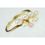 Freshwater pearl 14ct yellow gold cluster ring, eight white freshwater pearls with pink and green
