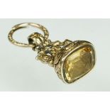 19th century citrine yellow metal fob seal, the intaglio citrine seal depicting a sunflower and