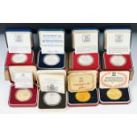 A Collection of eight sterling silver commemorative coins all within original display cases to