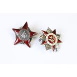 A CCCP / Russian Order Of The Red Star enamel badge together with a Russian Order Of The Patriotic