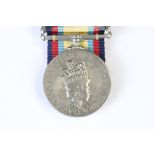 A British full size 1990-91 Gulf War Medal complete with ribbon and clasp, named and issued to LT.