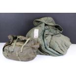A vintage 1980's West German snipers sleeping system to include quilted sleeping bag with arms and