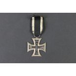 A full size World War One German EK2 Iron Cross Medal complete with ribbon.