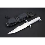 A survival / divers knife by Rostfrei complete with fitted scabbard.