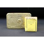 A British World War One Christmas 1914 brass gift tin complete with original cigarettes in packet.