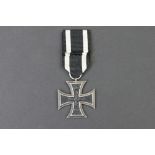 A full size World War One German EK2 Iron Cross Medal complete with ribbon, makers marked to