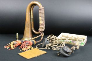 A small collection of mixed military collectables to include a copper & brass bugle, radio