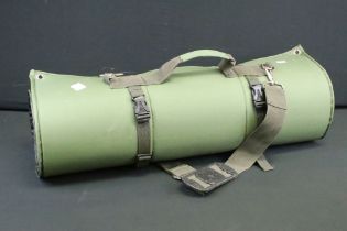 A green hunting / shooting portable padded ground sheet / mat.