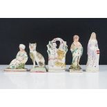 19th Century Victorian Staffordshire ceramic figurines to include a flat back couple, cat, veiled