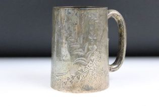 A Victorian fully hallmarked sterling silver tankard, assay marked for London and dated for 1877.