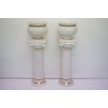 Pair of contemporary white ceramic jardinieres & stands with relief moulded clover & scrolling