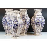 Set of four 20th Century ceramic vases of panelled octagonal design, each each having blue and