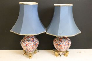 Pair of Chinese Imari table lamps of shouldered form, the floral & foliate decoration with gilt