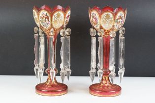 Pair of 19th Century Victorian cranberry glass lustres, each having scalloped rims with floral