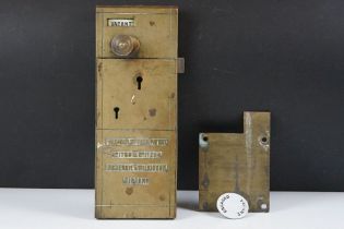 Early 20th Century Lockerbie and Wilkinson Brass coin operated toilet door lock with enamelled