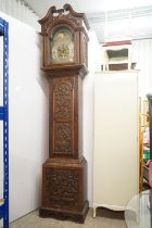 Late 19th / Early 20th century Oak Longcase Clock, the hood with swan neck pediment and Corinthian