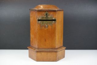 Late 19th Century Victorian oak hexagonal country house post box having a brass fret work slot to