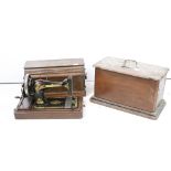 Singer sewing machine, cased together with another sewing machine, cased, with a plaque ' A. W.