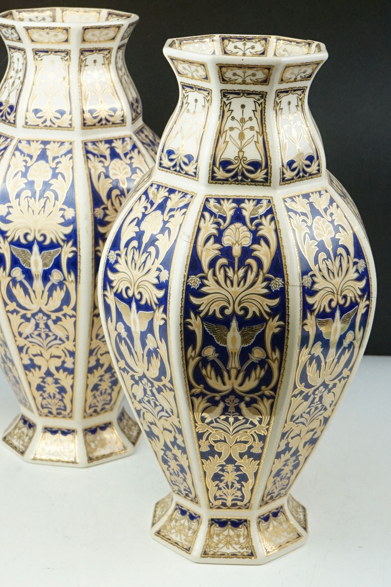 Set of four 20th Century ceramic vases of panelled octagonal design, each each having blue and - Image 5 of 16