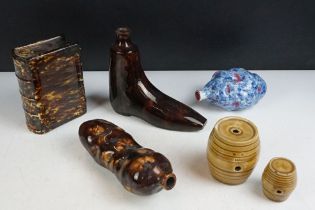 Six Victorian novelty ceramic spirit flasks to include a treacle glazed potato whiskey flask (19cm