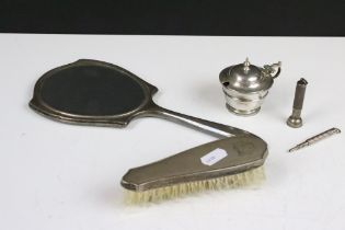 A fully hallmarked sterling silver backed brush and hand mirror together with a hallmarked silver