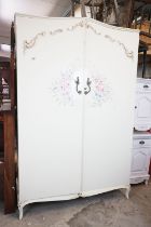 Mid century French style Cream Wardrobe, the two panel doors with applied scroll decoration and hand