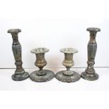 Pair of marble effect urn shaped jardinieres & stands, the stands of reeded form, raised on circular