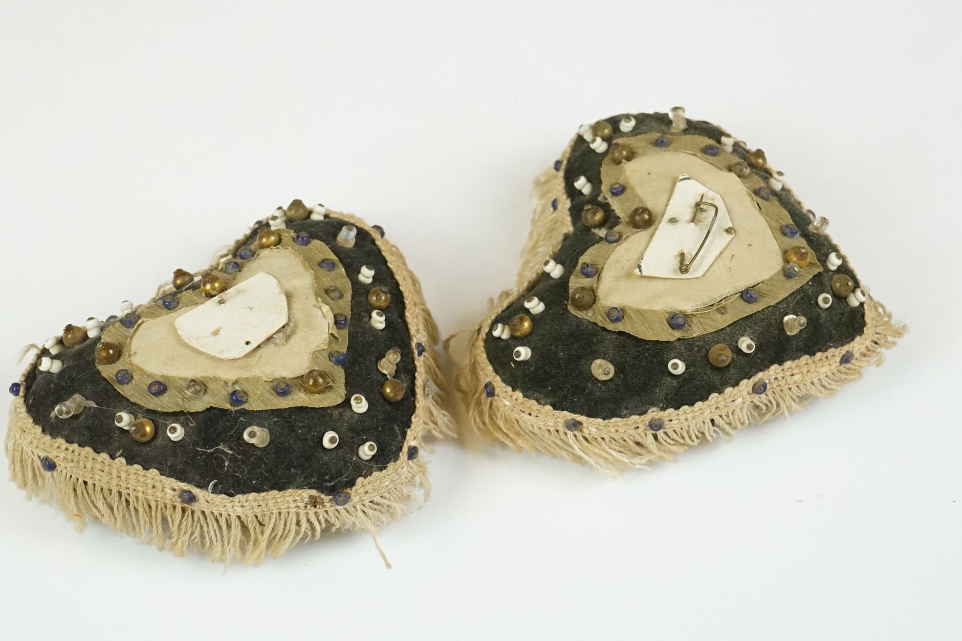 Four 19th Century Edwardian pin cushions to include one commemorative example stitched with a - Image 2 of 14