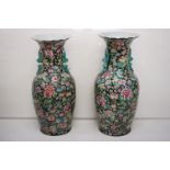 Pair of 20th century large Chinese famille rose floor standing baluster vases, with enamelled floral