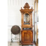 19th century Walnut Cased ' Penny in the Slot ' Upright Polyphon, the architectural pediment with