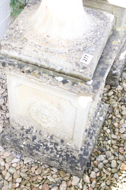 Pair of reconstituted stone garden urns of campana form, with relief facial mask decoration and - Image 2 of 3